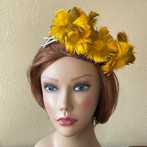 Vintage marigold yellow flower/feathers on brown feathered half hat